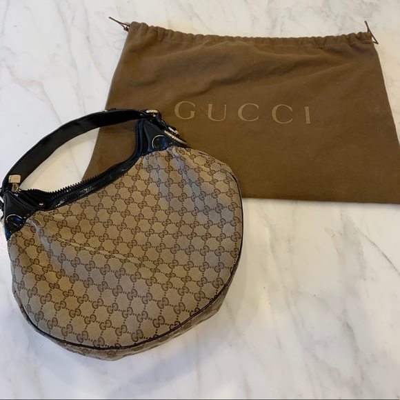 Gucci Handbags - Black & Tan Gucci GG Hobo Bag